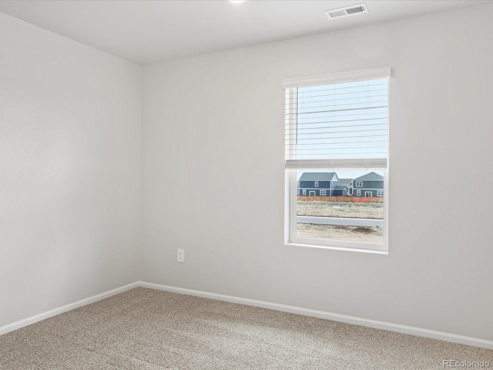 7331 West 27th Street Greeley, CO 80634 - Photo 25 of 40 an empty room with a window
