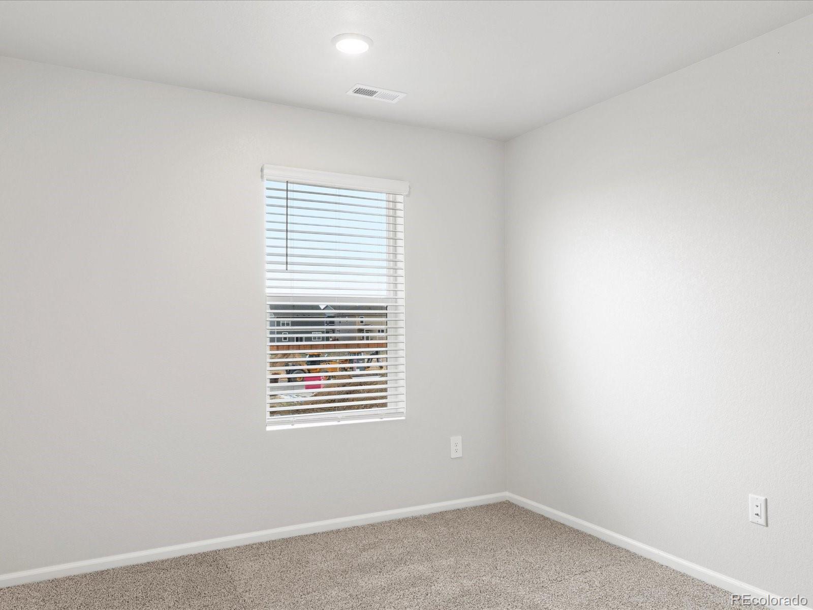 7331 West 27th Street Greeley, CO 80634 - Photo 31 of 40 an empty room with a window