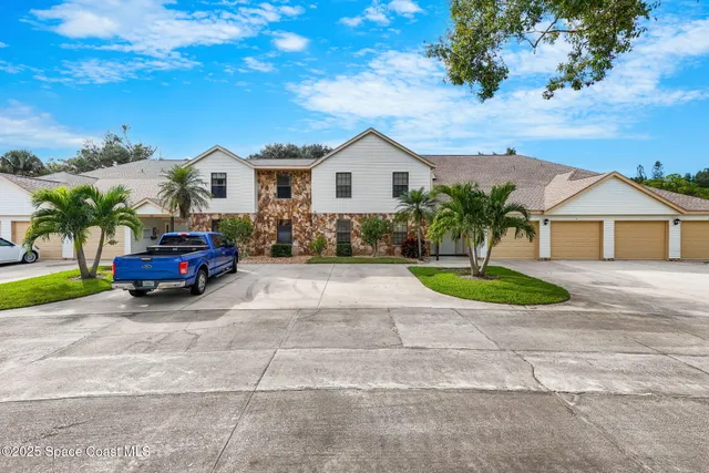 a house view with a garden space