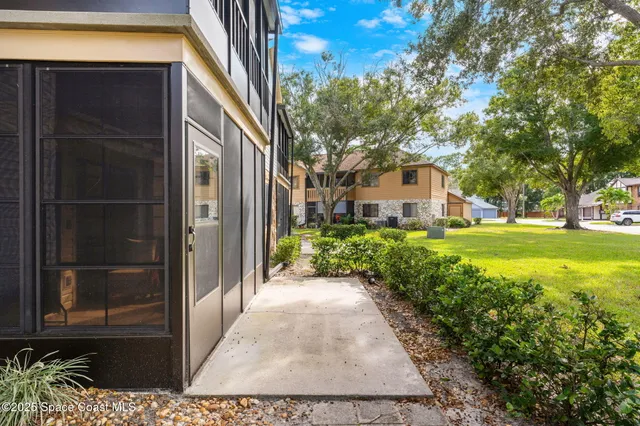 a view of a back yard of the house