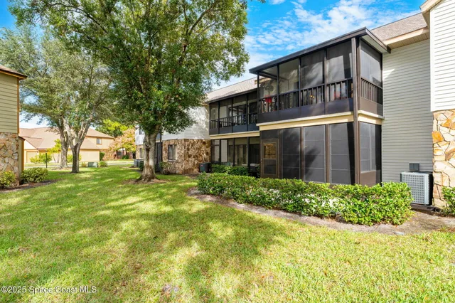 a view of a yard in front of a house