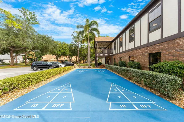 a building with trees in front of it