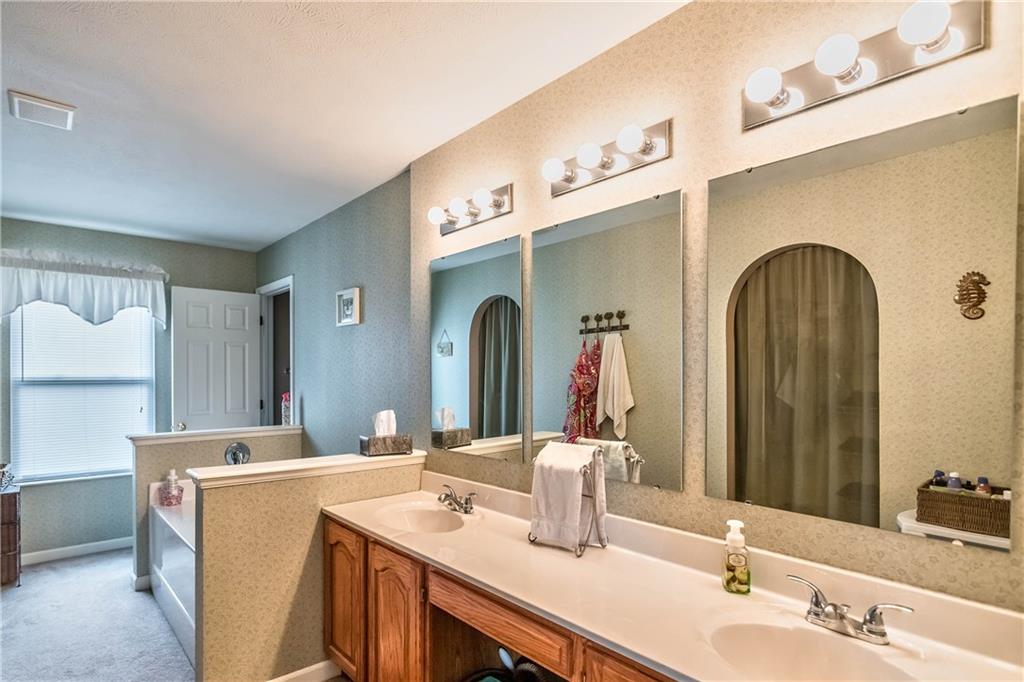 149 Riemer Road Sarver, PA 16055 - Photo 21 of 24 This large master bathroom includes double sinks, loads of counter space, a large bathtub and a separate shower.