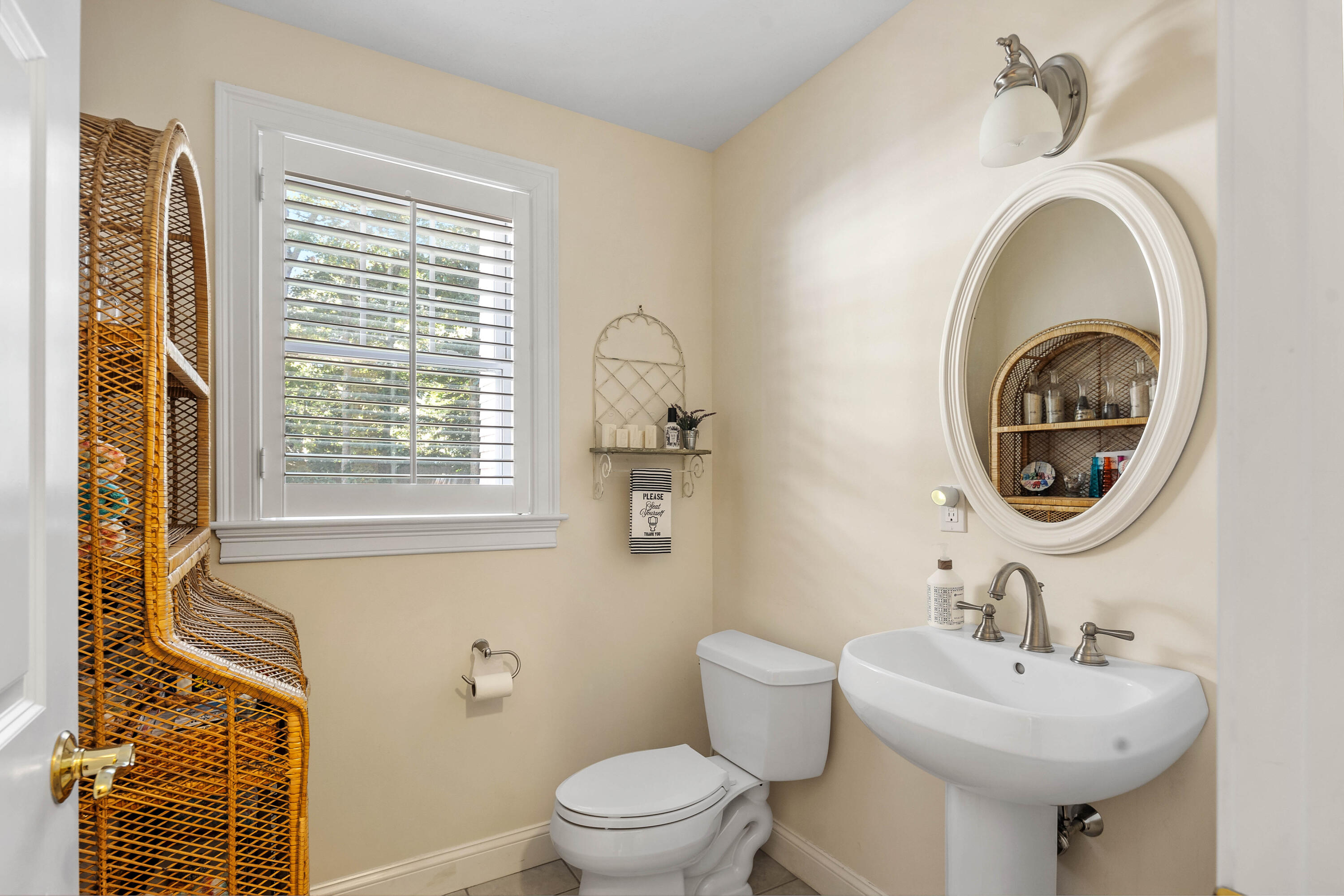 193 Fells Pond Road Mashpee, MA 02649 - Photo 14 of 33 a bathroom with a toilet sink and mirror