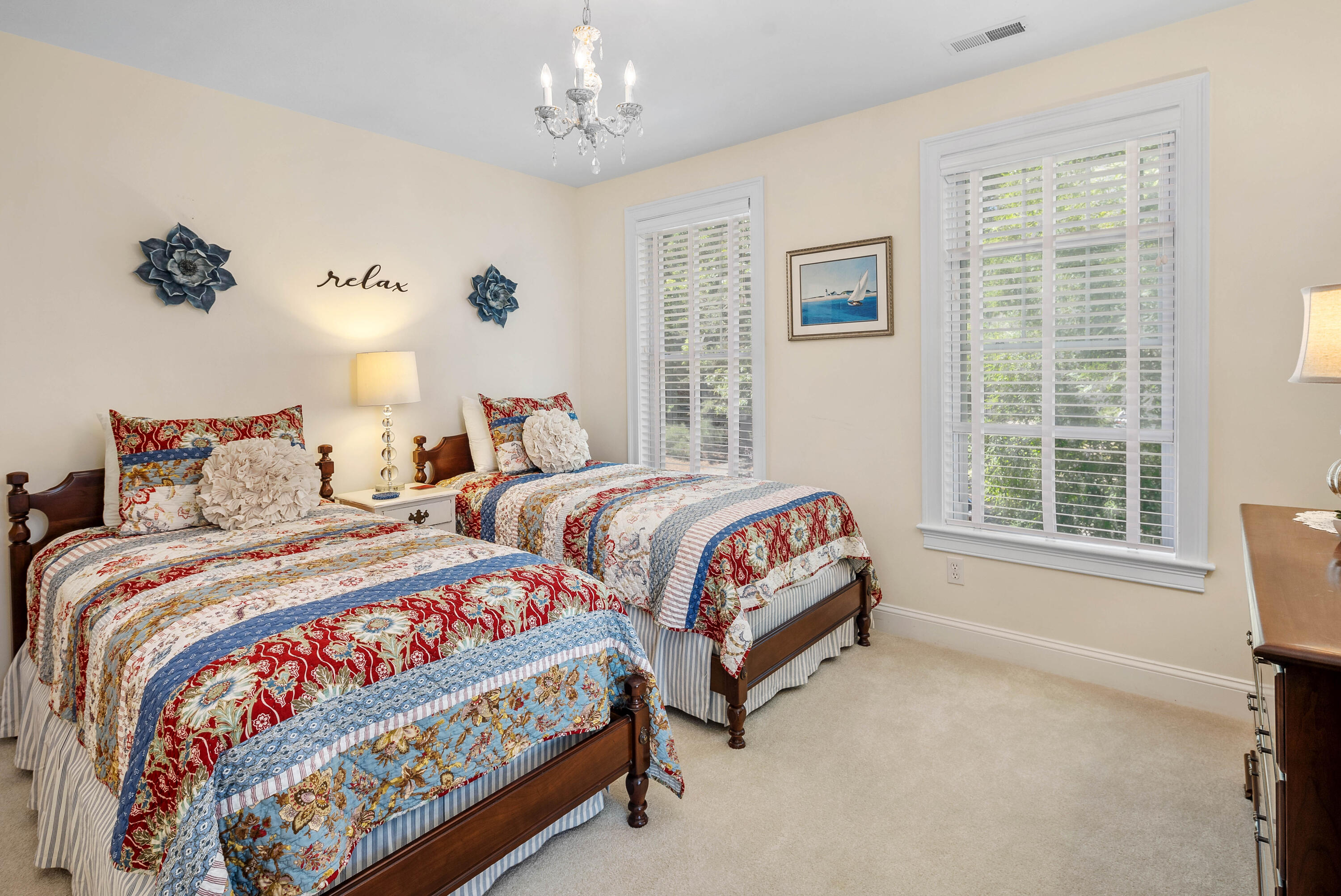 193 Fells Pond Road Mashpee, MA 02649 - Photo 17 of 33 a spacious bedroom with two beds and a window