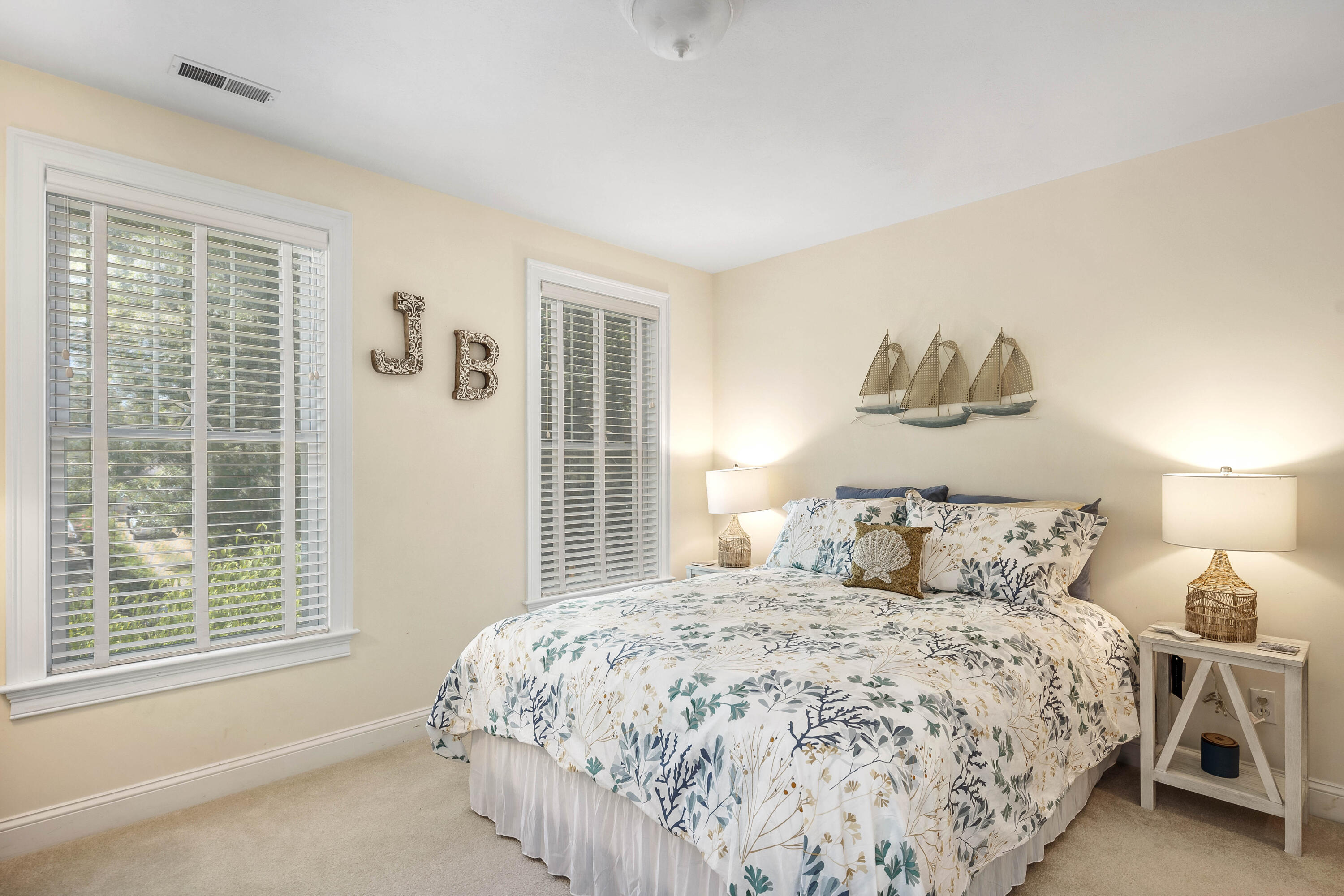 193 Fells Pond Road Mashpee, MA 02649 - Photo 19 of 33 a bedroom with a bed and a window