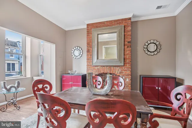 a view of a livingroom with furniture and entryway