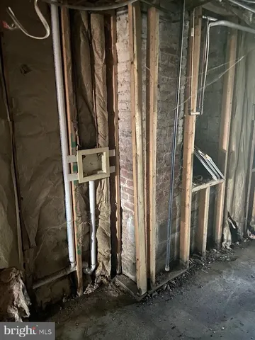 a view of an entryway with a door