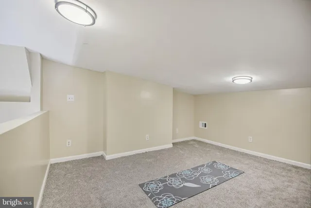 a view of a room with racks on the wall