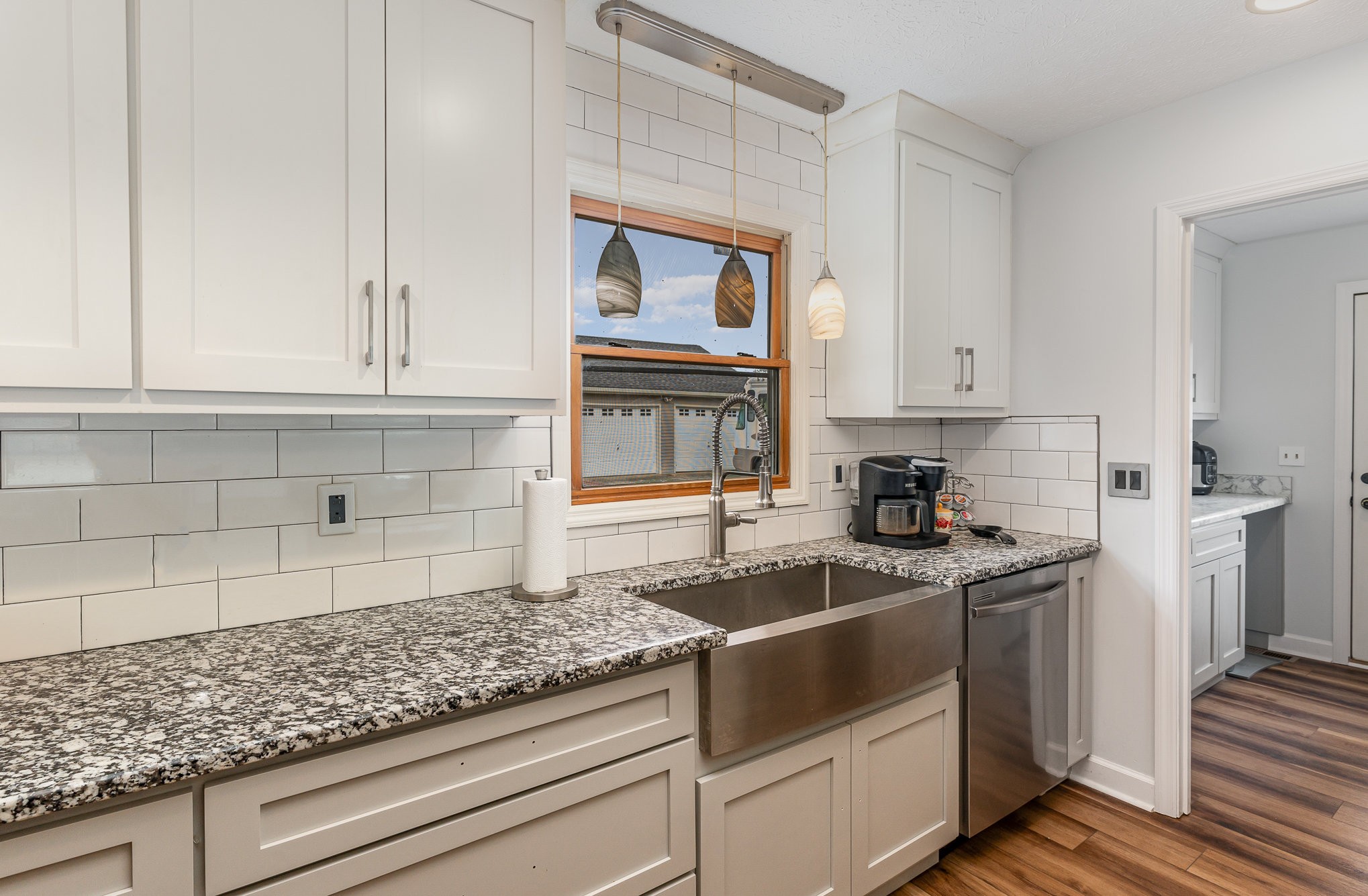3831 Armstrong Road Springfield, TN 37172 - Photo 11 of 30 a kitchen with granite countertop white cabinets and stainless steel appliances