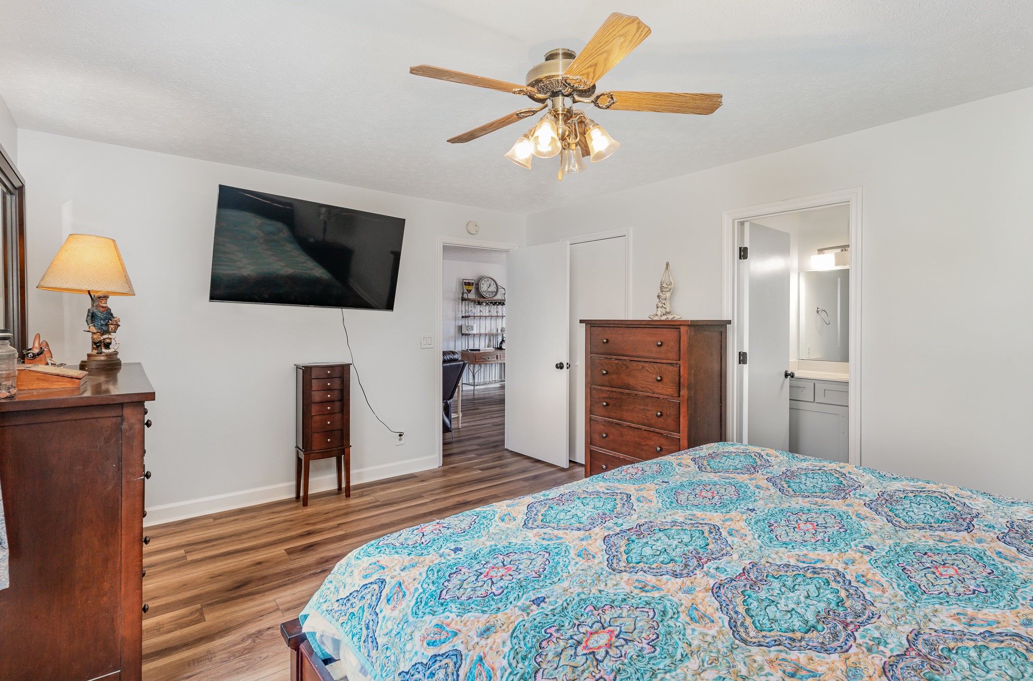 3831 Armstrong Road Springfield, TN 37172 - Photo 17 of 30 a bedroom with a bed and a flat screen tv