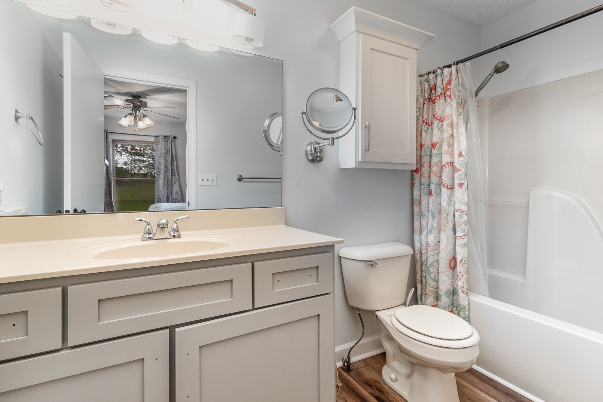 3831 Armstrong Road Springfield, TN 37172 - Photo 18 of 30 a bathroom with a sink a toilet a mirror and shower
