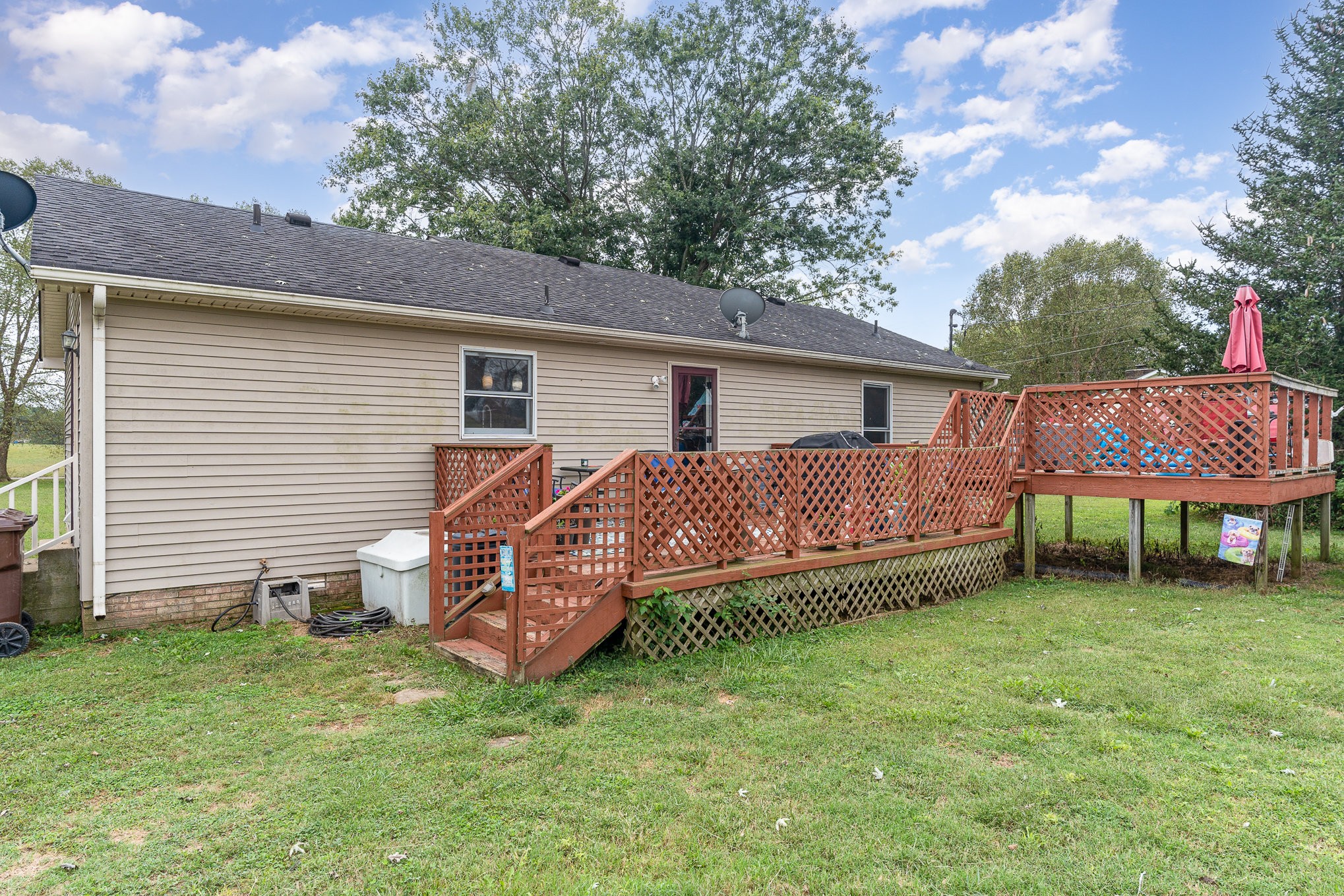 3831 Armstrong Road Springfield, TN 37172 - Photo 26 of 30 a view of a house with a backyard and sitting area