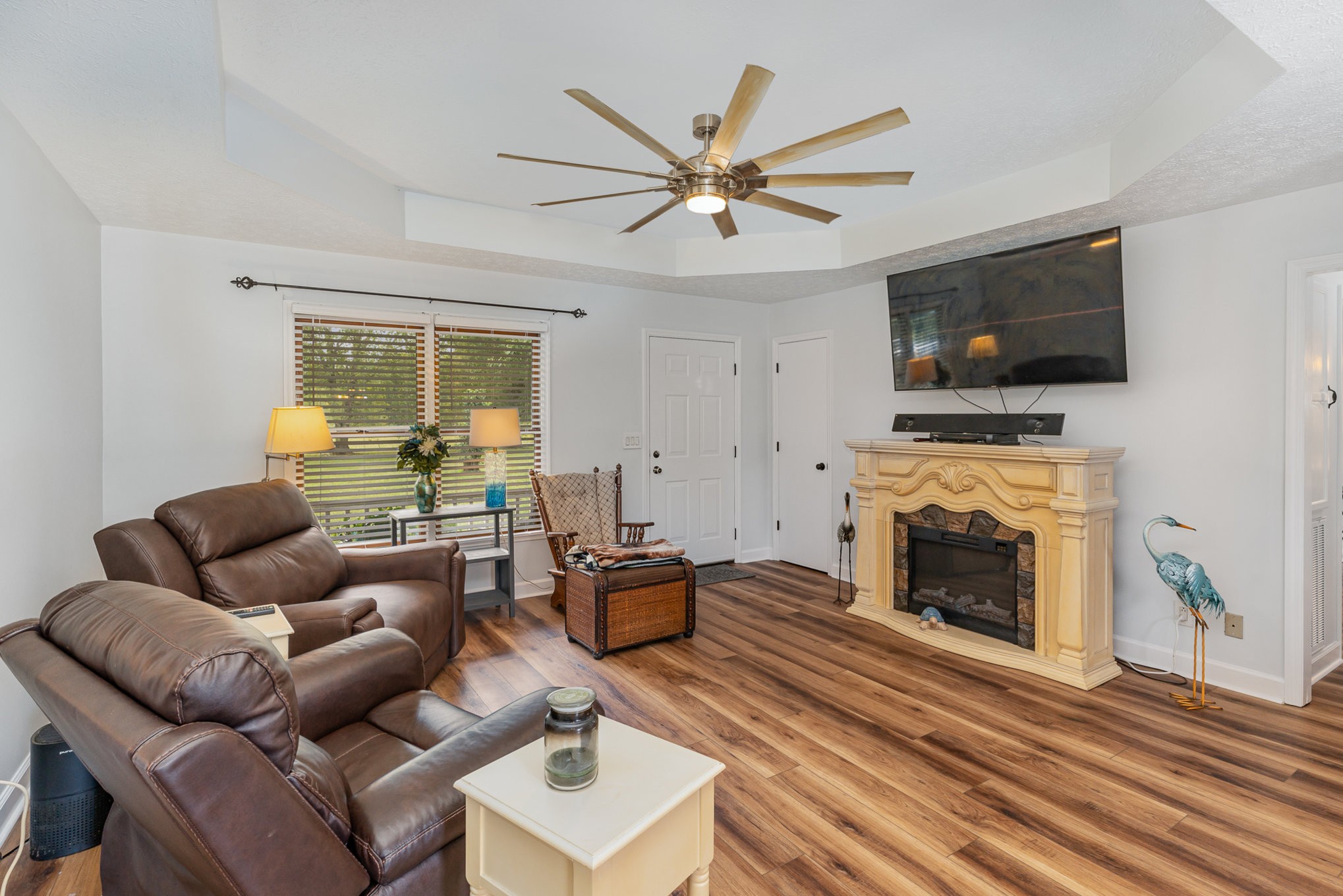 3831 Armstrong Road Springfield, TN 37172 - Photo 4 of 30 a living room with furniture a flat screen tv and a fireplace
