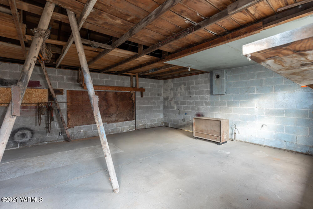 307 Nealy Road Grandview, WA 98930 - Photo 18 of 20 a view of a room with wooden walls