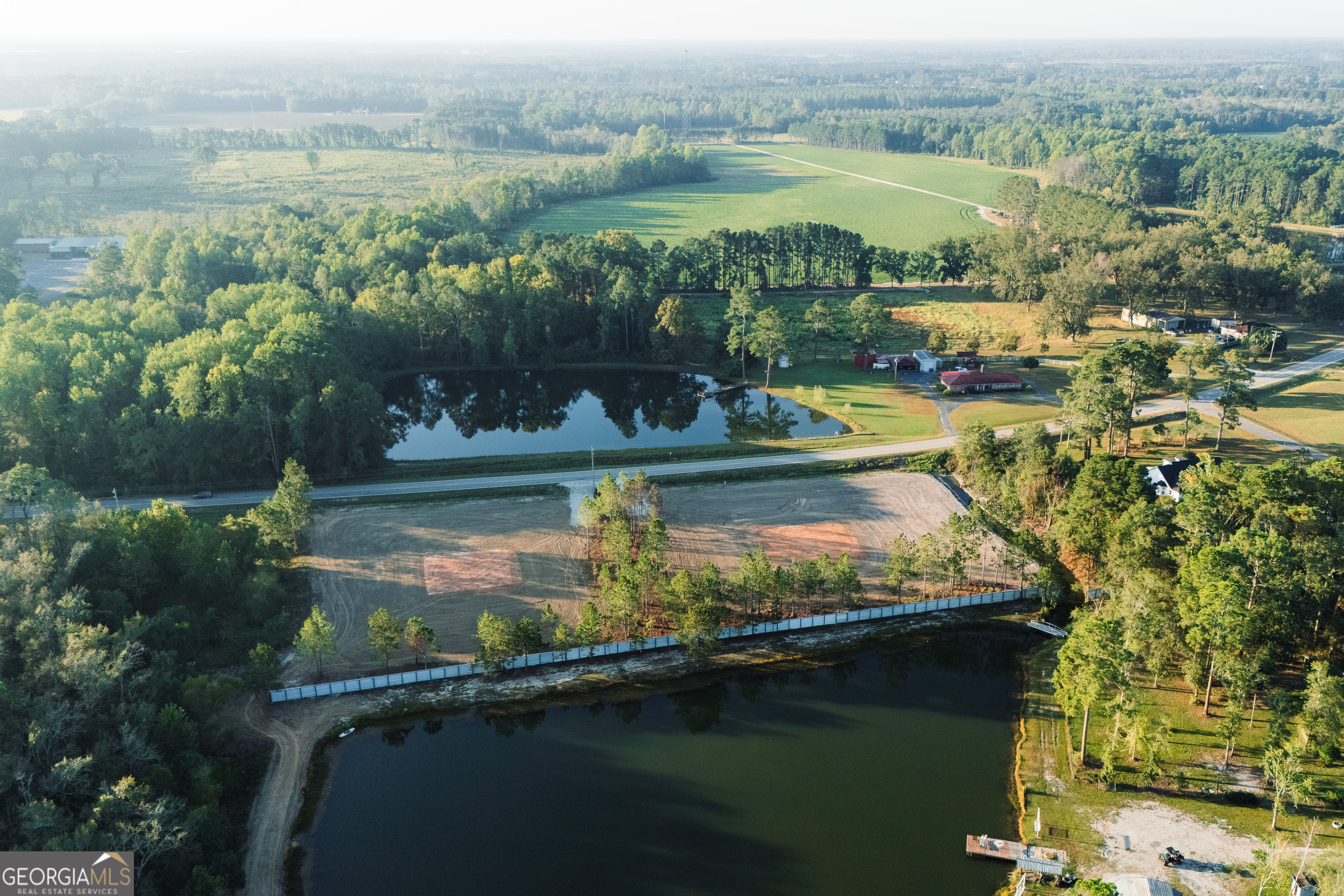 Lot 3 Pulaski Road Statesboro, GA 30458 - Photo 10 of 20 a view of a lake with a city view