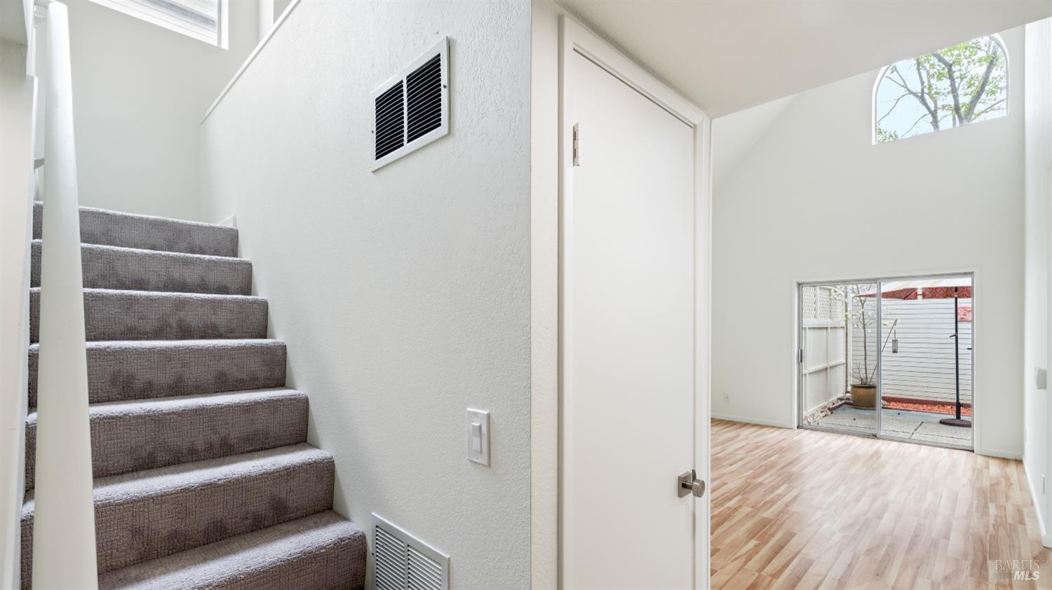 3335 Yulupa Avenue Santa Rosa, CA 95405 - Photo 22 of 39 The staircase has been refreshed with new carpet and paint, leading to the primary bedroom and bathroom retreat.