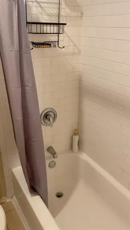 a bathroom with a toilet and a sink