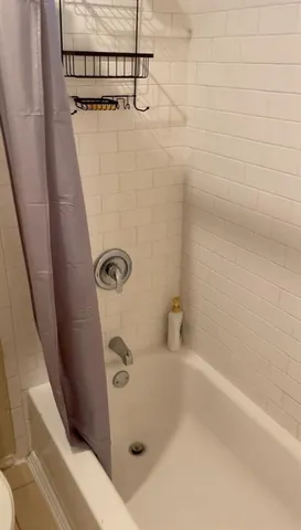 a bathroom with a toilet and a sink