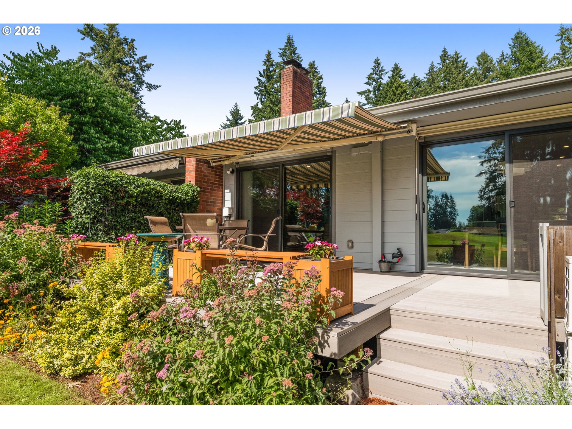1200 Northeast Territorial Road, Unit 12 Canby, OR 97013 - Photo 20 of 38 a view of a house with patio outdoor seating
