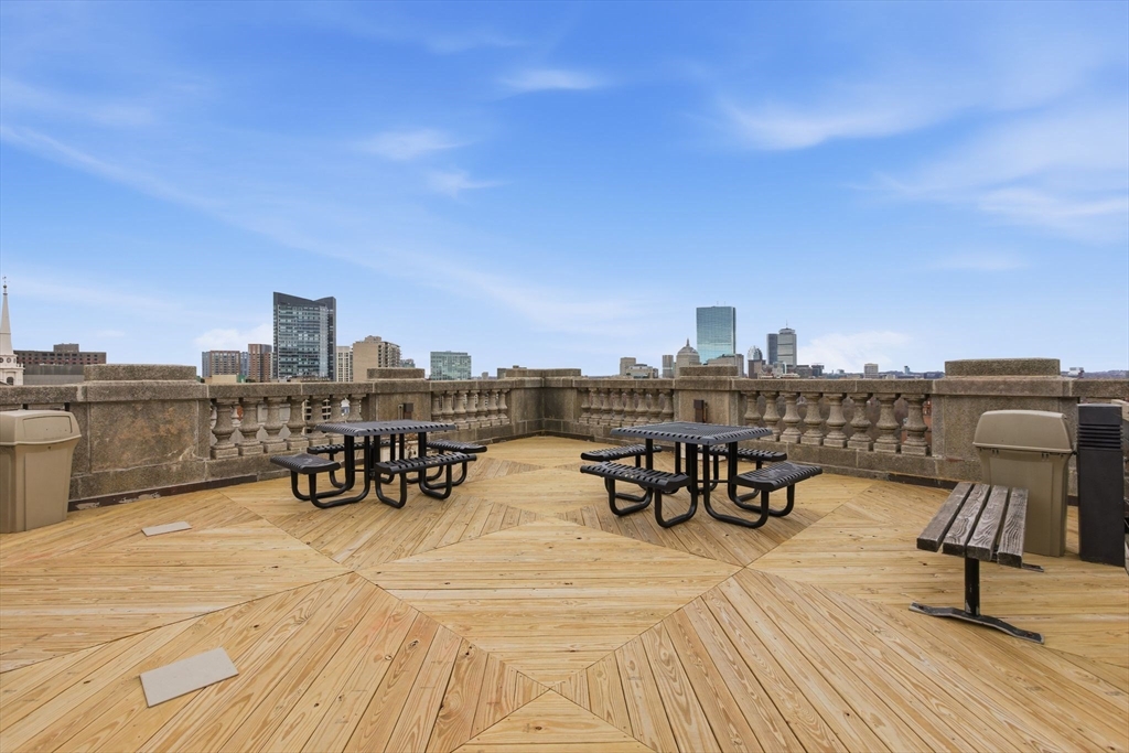 21 Beacon Street, Unit 11L Boston, MA 02108 - Photo 13 of 23 a view of a terrace with chairs
