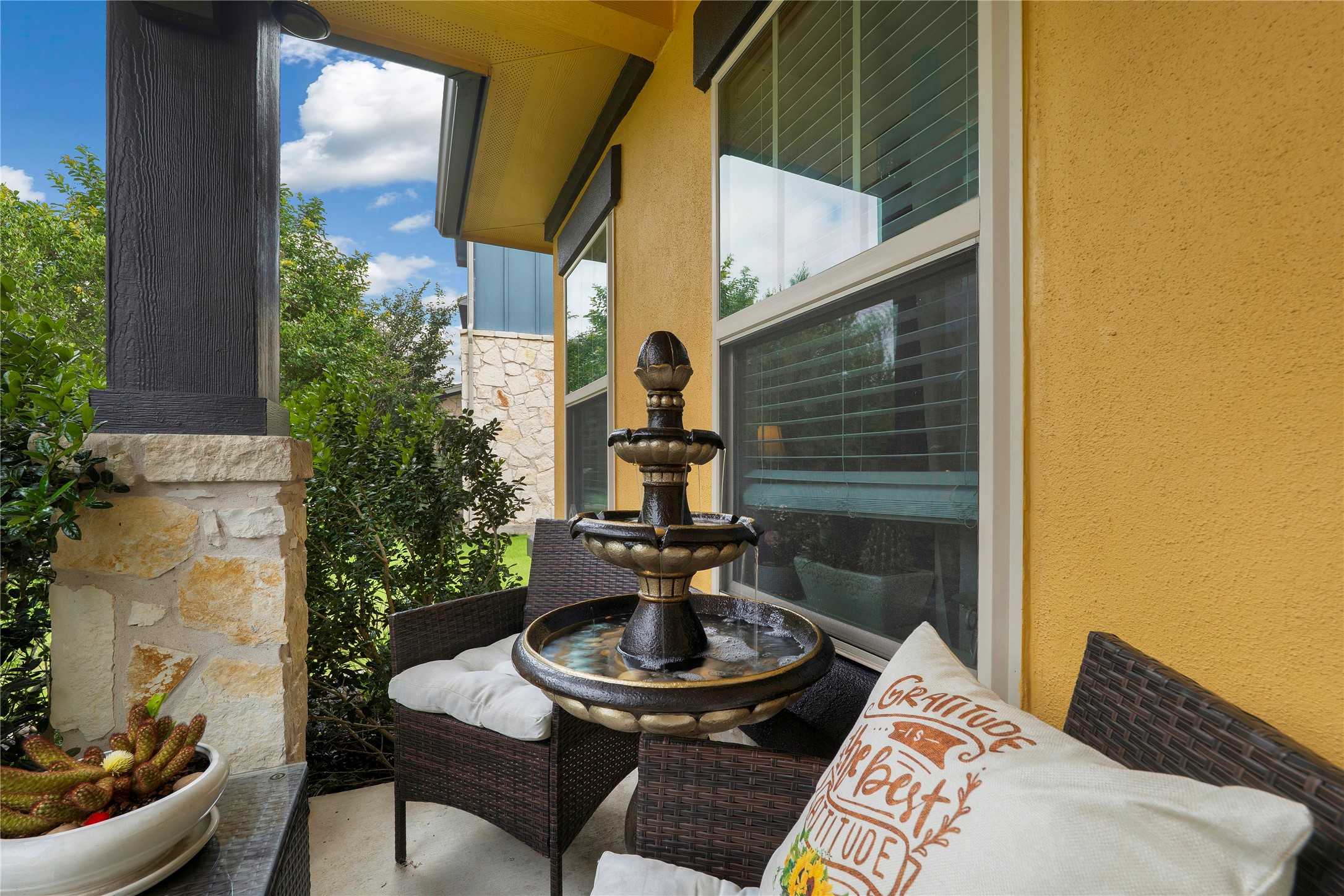8721 Sikes Way Austin, TX 78747 - Photo 3 of 33 a backyard of a house with seating space