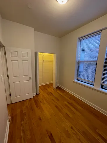 a view of entryway and hall with a window