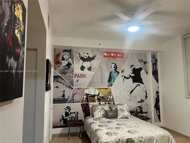 a view of a bedroom with bed and closet