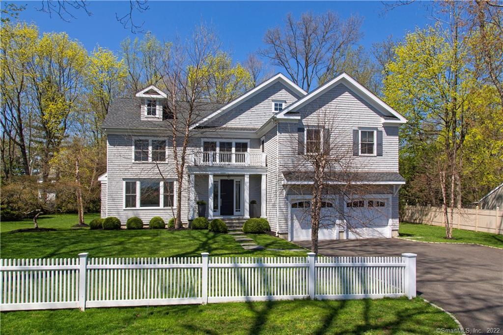 6 Keene Road Westport, CT 06880 - Photo 1 of 1 a front view of a house with a yard