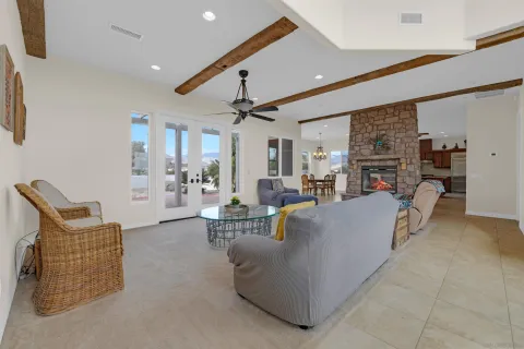 a living room with furniture and a table