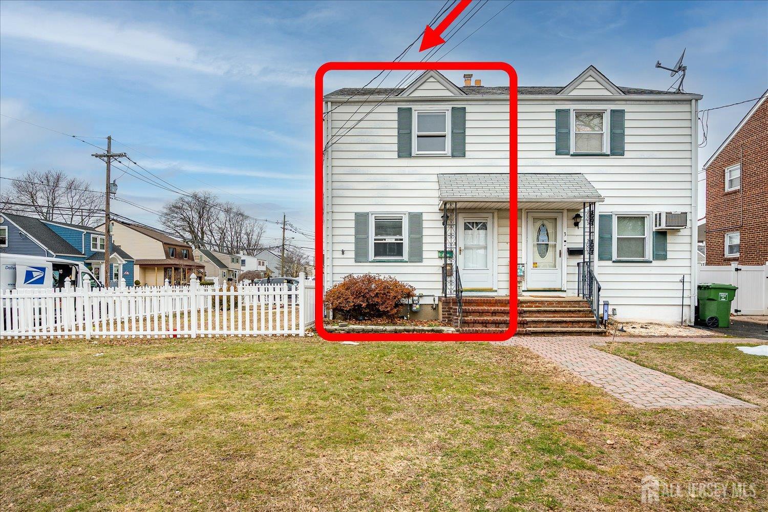 a front view of a house with a outdoor space