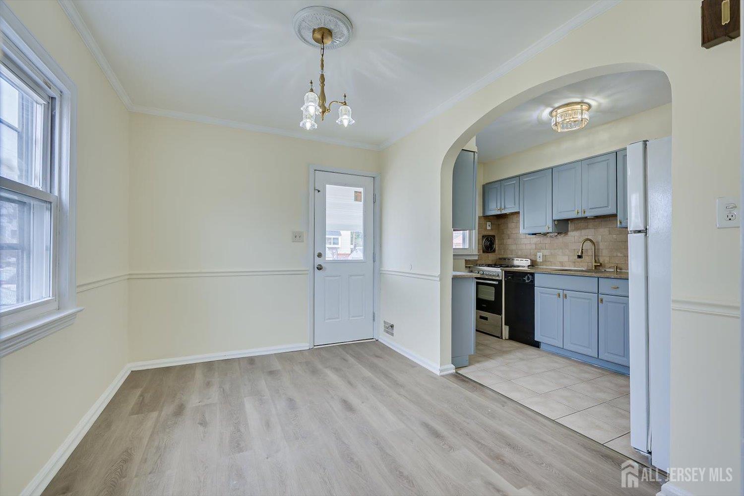 1 Coolidge Avenue Edison, NJ 08837 - Photo 15 of 27 a kitchen with stainless steel appliances a refrigerator sink and cabinets