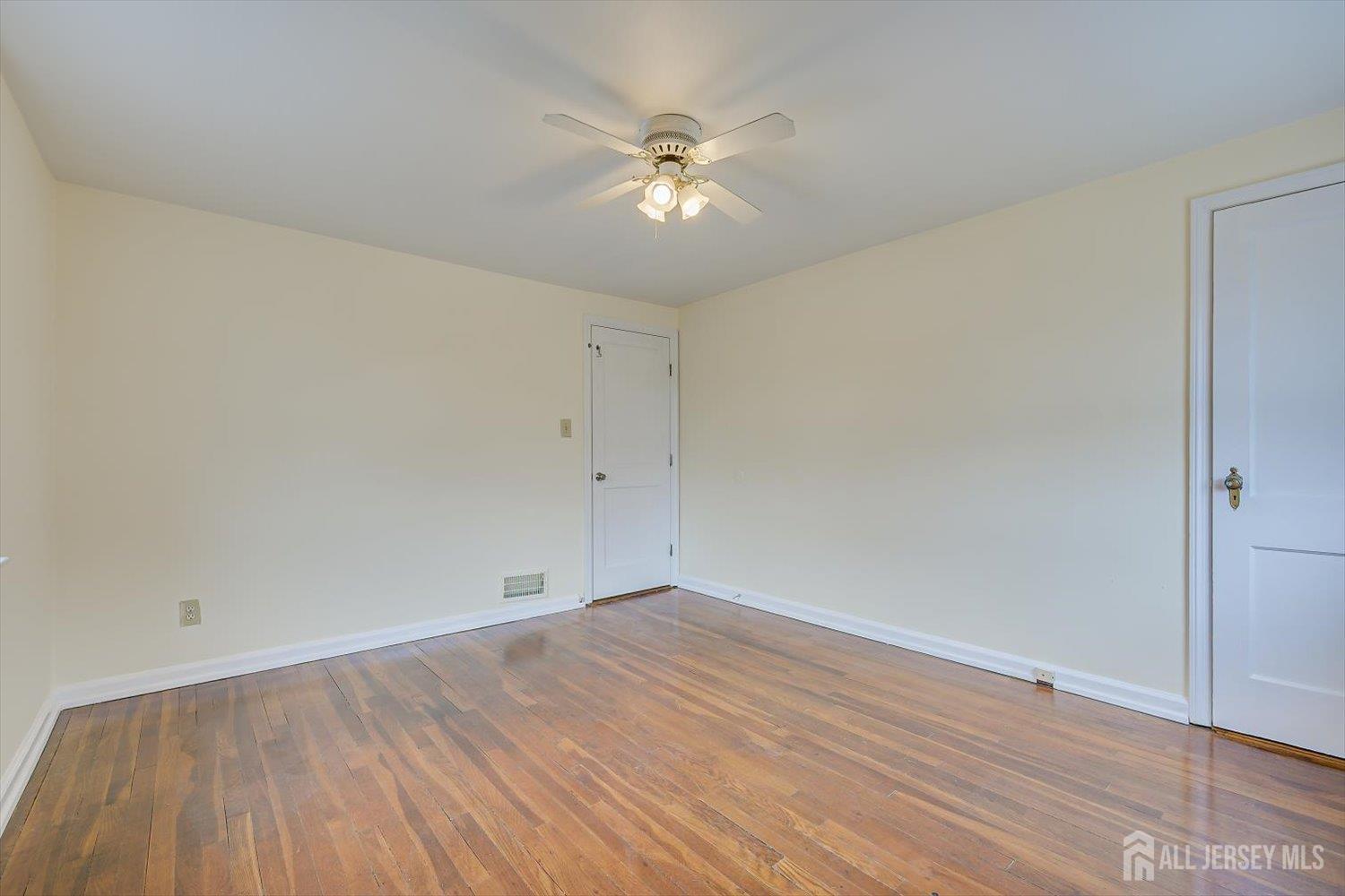 1 Coolidge Avenue Edison, NJ 08837 - Photo 19 of 27 wooden floor in an empty room