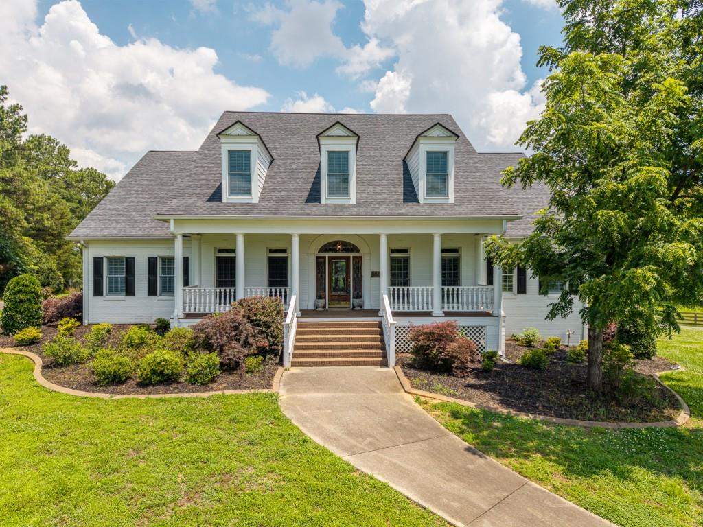 774 Bray Road Southwest Calhoun, GA 30701 - Photo 2 of 106 a front view of a house with a yard