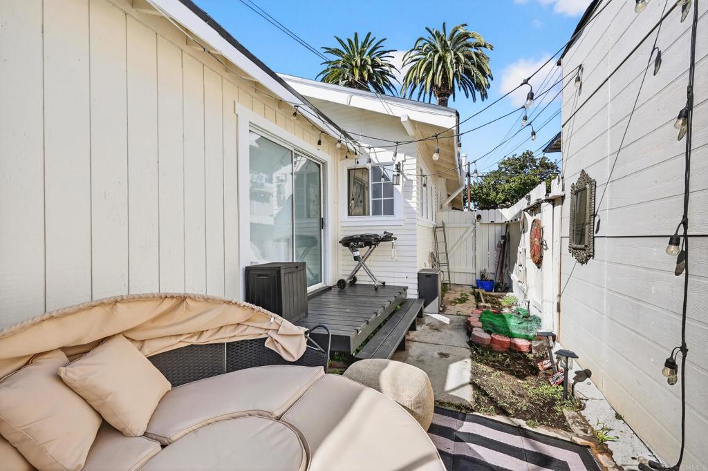1530 East Appleton Street Long Beach, CA 90802 - Photo 25 of 61 a balcony with furniture and a potted plant