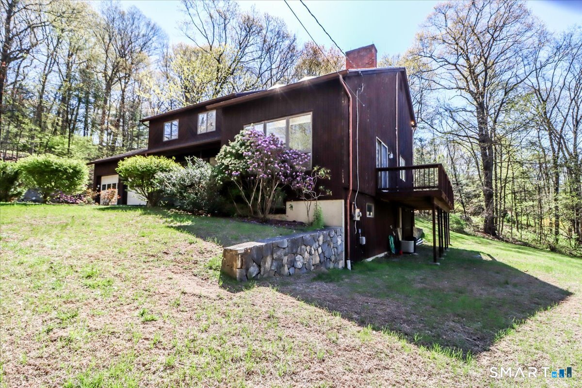 63 North Mountain Road Brookfield, CT 06804 - Photo 2 of 34 separate entrance to finished lower level is under deck.
