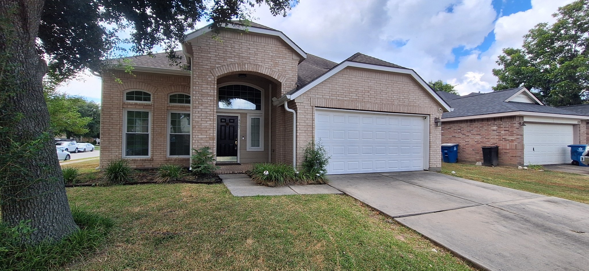 4507 Bridgestone Point Drive Spring, TX 77389 - Photo 1 of 21 a front view of a house with garden