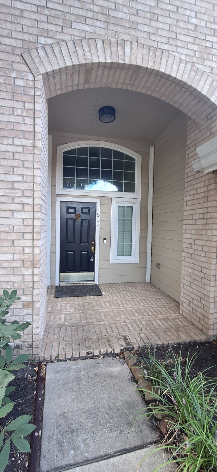4507 Bridgestone Point Drive Spring, TX 77389 - Photo 21 of 21 a front view of a house with a yard and garage