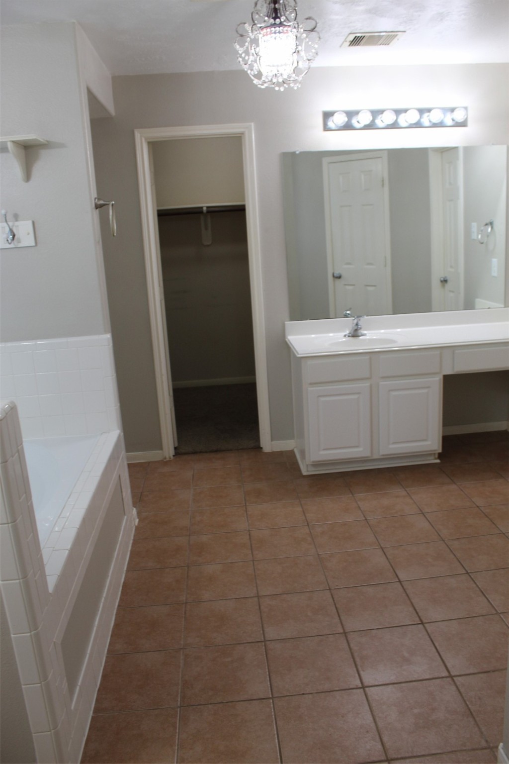 4507 Bridgestone Point Drive Spring, TX 77389 - Photo 9 of 21 a bathroom with a sink a mirror and a bathtub