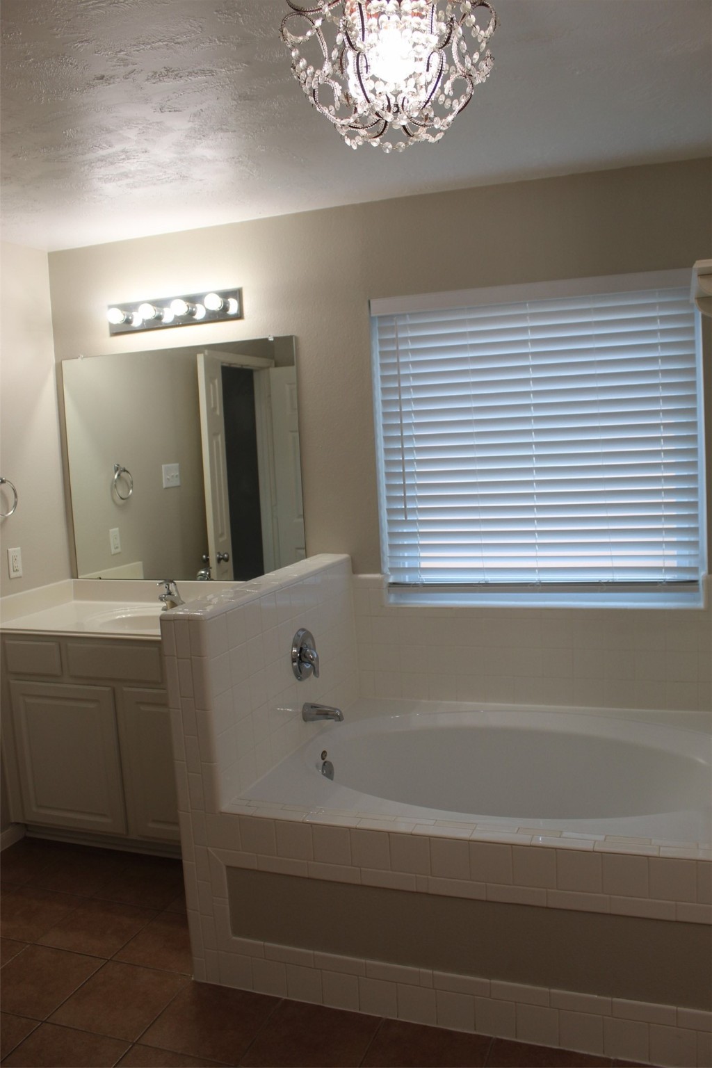 4507 Bridgestone Point Drive Spring, TX 77389 - Photo 10 of 21 a bathroom with a bathtub a sink and a window