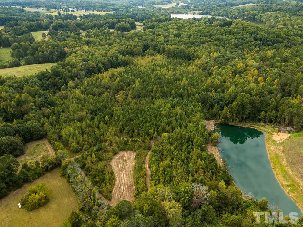 1 Country Club Road Roxboro, NC 27574 - Photo 14 of 29 a view of a lake view with houses in back