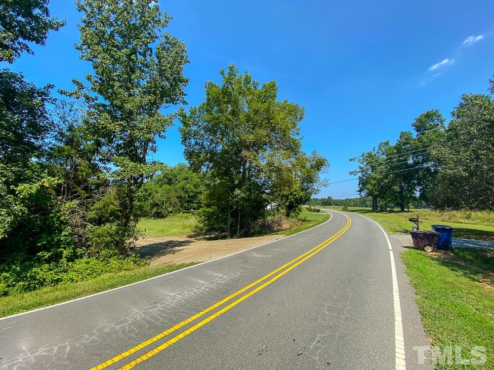 1 Country Club Road Roxboro, NC 27574 - Photo 6 of 29 a view of a street with a park