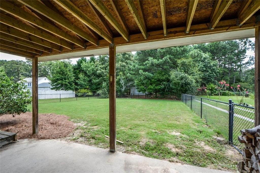 3420 Bulloch Lake Road Loganville, GA 30052 - Photo 50 of 57 a view of backyard with green space