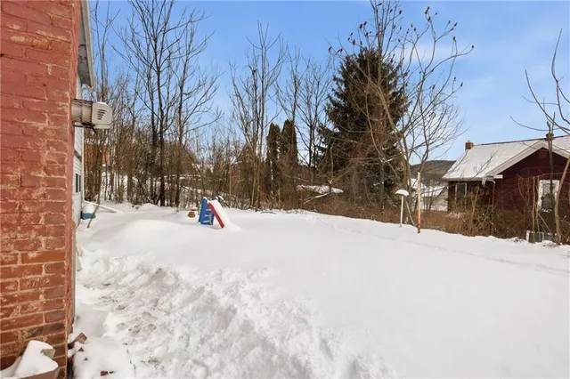 a car parked in front of a house