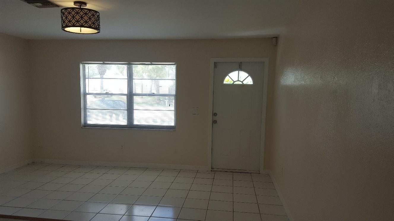 6180 Kendrick Street Jupiter, FL 33458 - Photo 2 of 14 living room