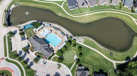 an aerial view of a swimming pool