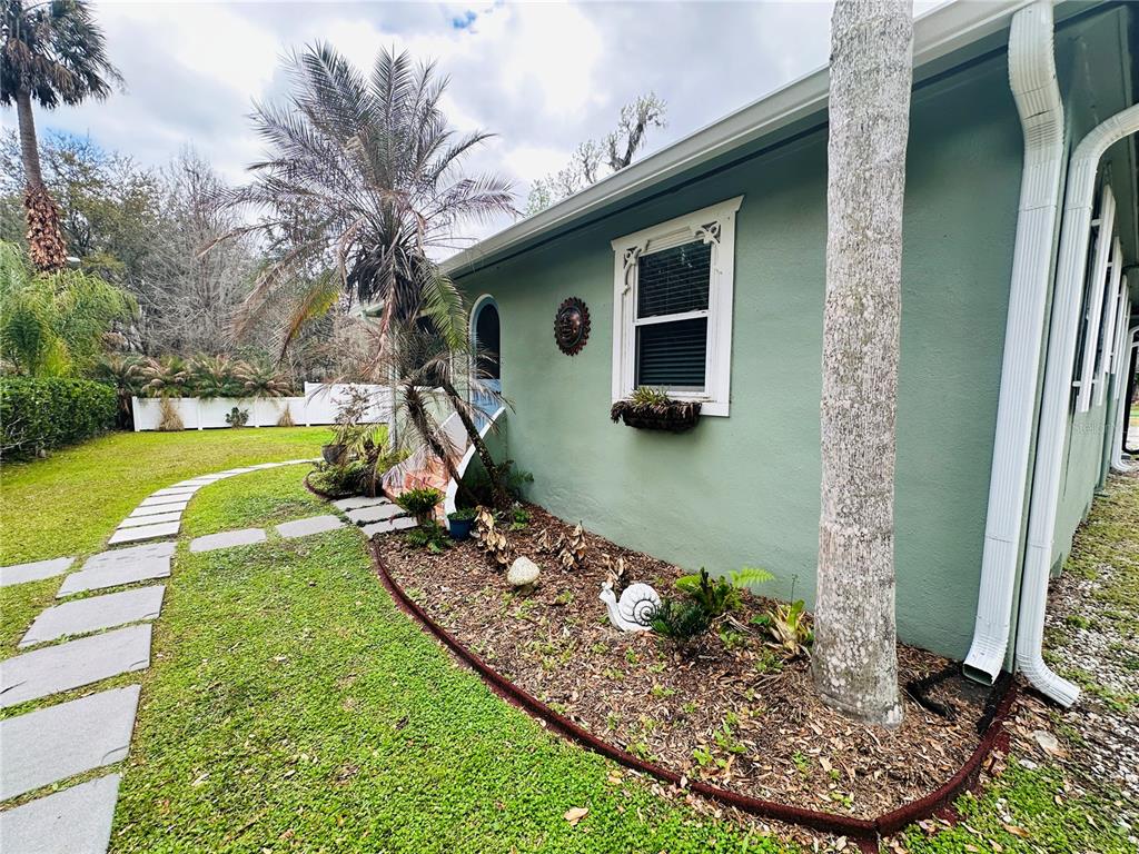 357 Magnolia Place DeBary, FL 32713 - Photo 6 of 50 a view of a house with backyard