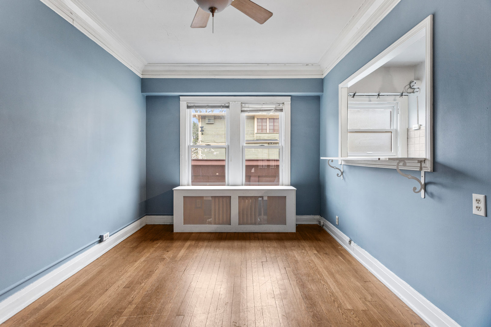 307 North Prairie Street, Unit 3 Champaign, IL 61820 - Photo 18 of 34 an empty room with a window