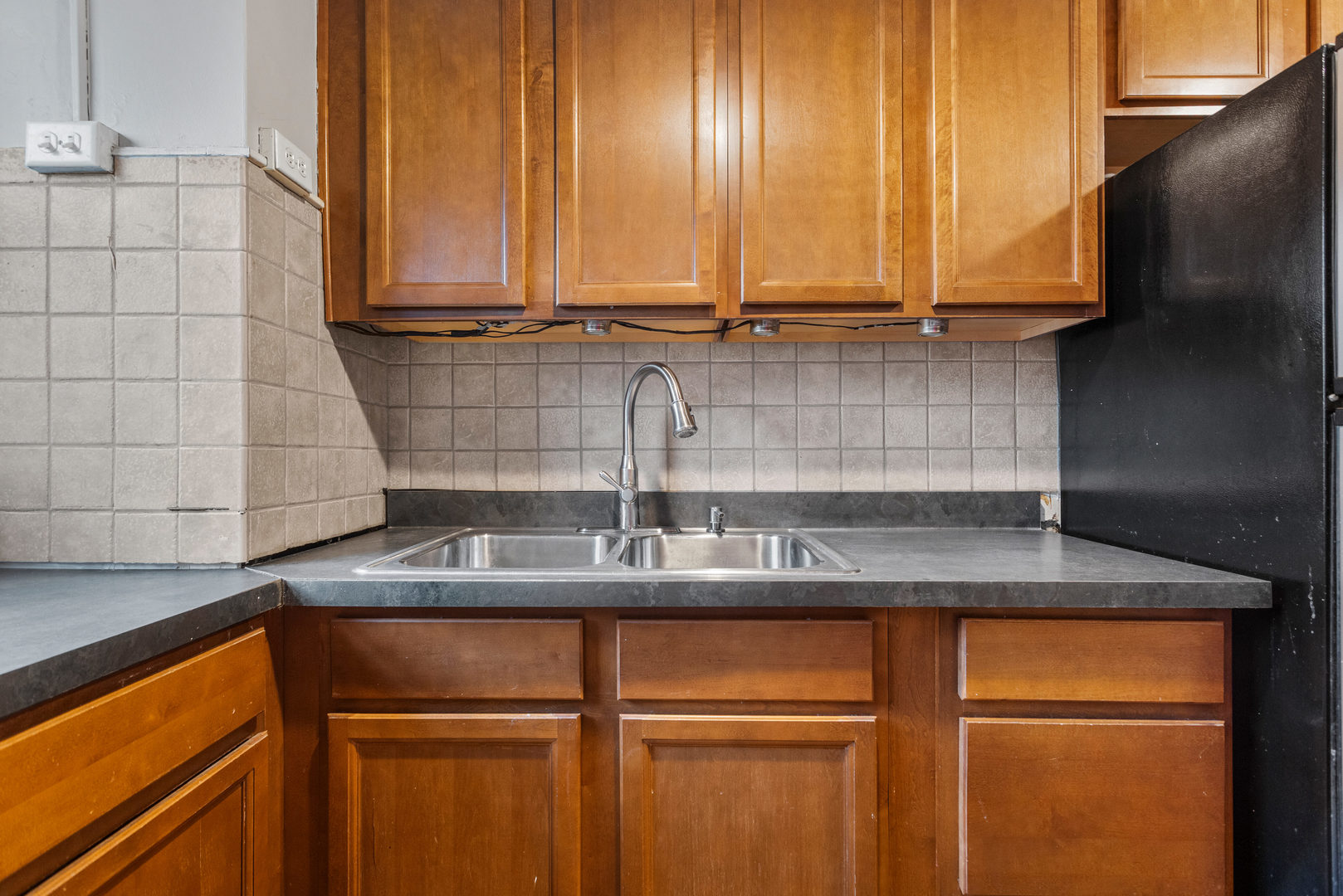 307 North Prairie Street, Unit 3 Champaign, IL 61820 - Photo 22 of 34 a kitchen with stainless steel appliances granite countertop a sink and cabinets