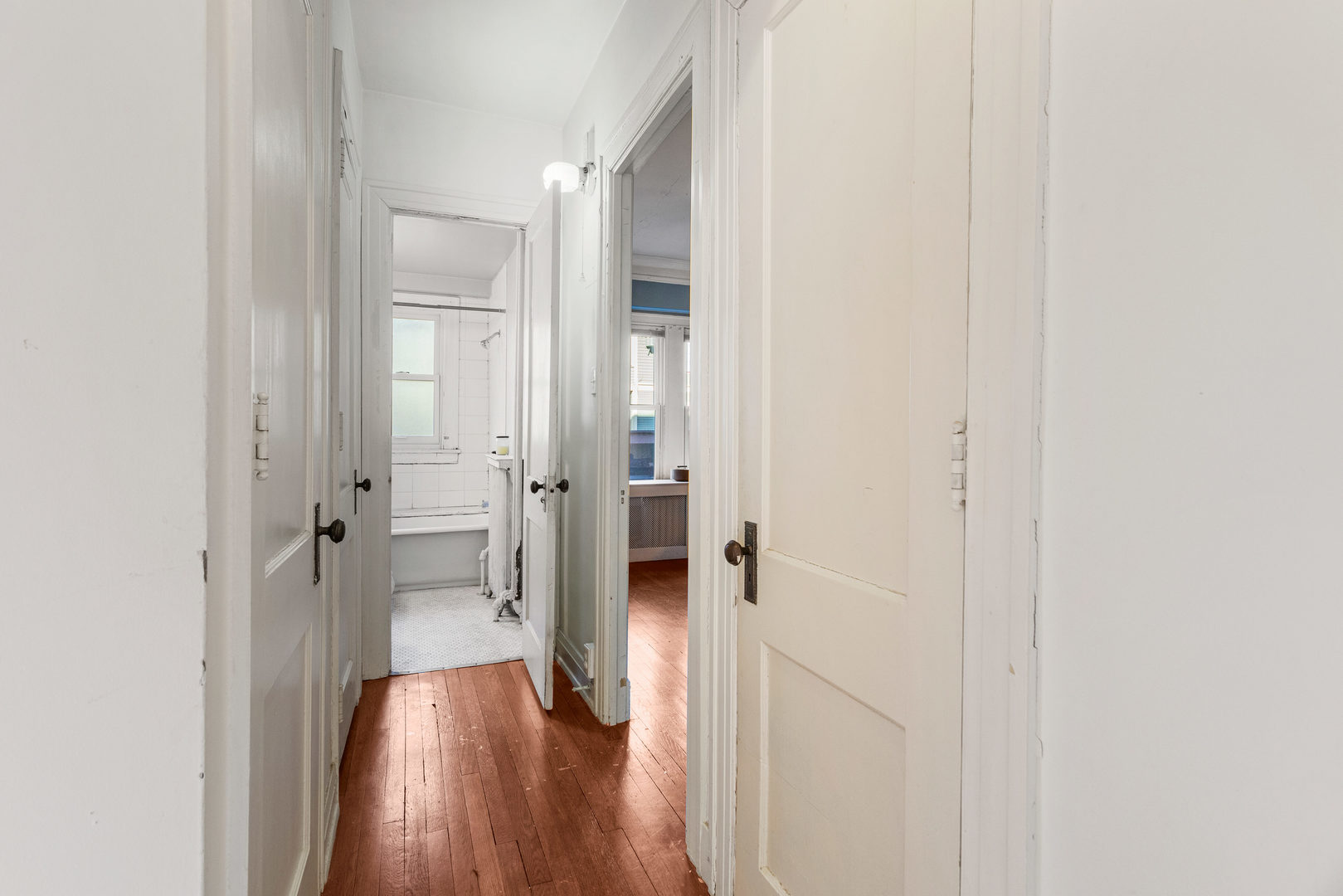 307 North Prairie Street, Unit 3 Champaign, IL 61820 - Photo 24 of 34 a view of a hallway with wooden floor